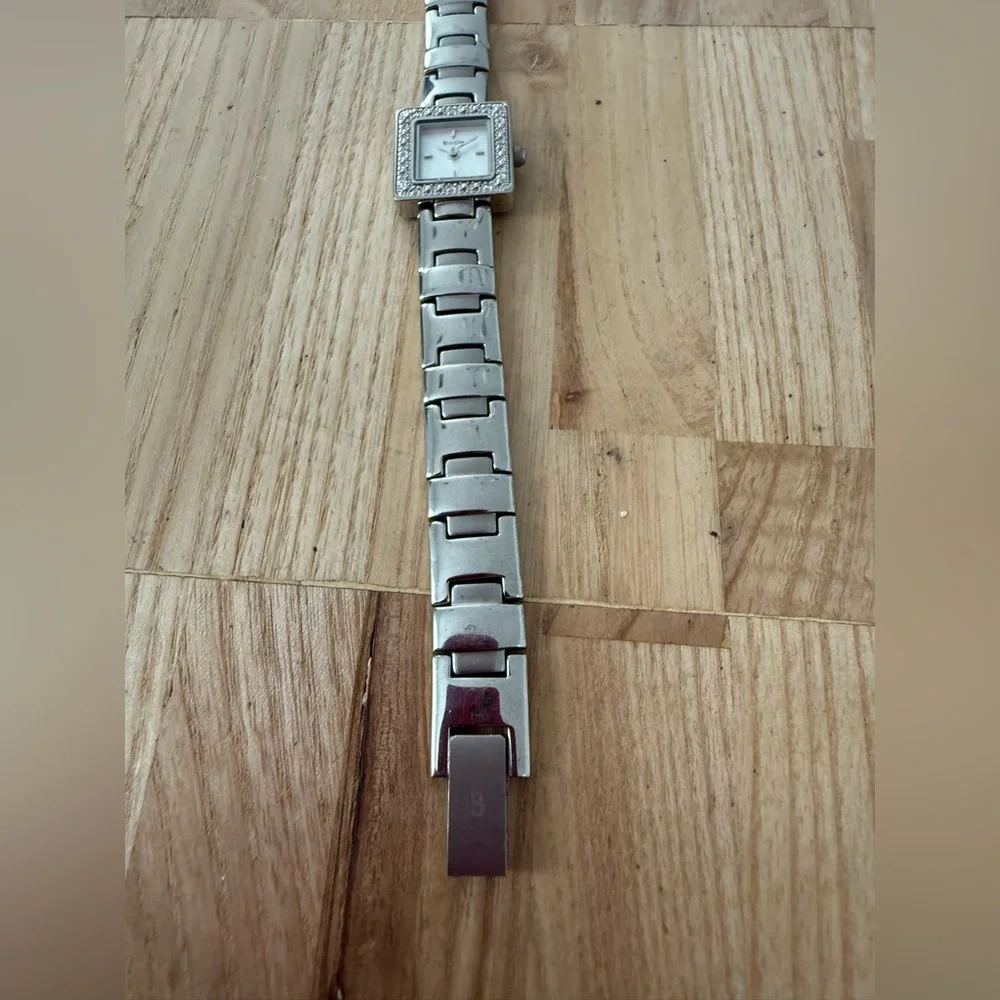 Dainty Bulova ladies square silver tone watch NEW BATTERY